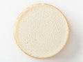 A close-up view of a single slice of white bread on a white background Royalty Free Stock Photo
