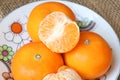 Close up view of sliced fresh Oranges fruit on a plate. Wogan Orange Royalty Free Stock Photo