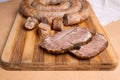 Close up view of sliced roasted traditional homemade sausage wit