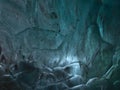Slightly blue shimmering ice surface on the ceiling of Sapphire Ice Cave in BreiÃÂ°amerkurjÃÂ¶kull glacier, VatnajÃÂ¶kull, Iceland. Royalty Free Stock Photo