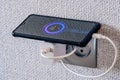 Close-up view of smartphone charging Low battery level Royalty Free Stock Photo