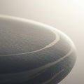 A close-up view of a smooth, rounded object with a textured surface and subtle, Royalty Free Stock Photo