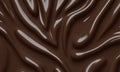 close-up view smooth, shiny chocolate surface with wavy texture, creating sense depth and movement. Royalty Free Stock Photo