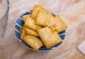 Heap of crunchy crackers on snack plate