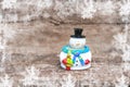 Close up view of snowman in winter Christmas day on wooden background Royalty Free Stock Photo