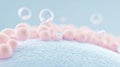 Close-up view of soft pink spheres and transparent bubbles on textured surface, creating a soothing and abstract visual Royalty Free Stock Photo