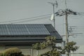 A close up view of solar panels installed on a residential roof, set against a Royalty Free Stock Photo