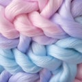 Close-up view of soothing pastel wool intertwined in visually captivating texture