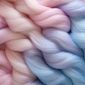 Close-up view of soothing pastel wool intertwined in visually captivating texture