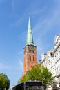 Close-up view of spire steeple of St Jakobi gothic church with clocks in old Lubeck town center. UNESCO heritage city Royalty Free Stock Photo