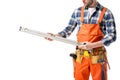 Close-up view of spirit level in hands of workman in orange overall