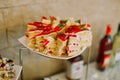 The close-up view of the sponge cakes decorated with red jelly. Royalty Free Stock Photo