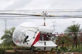 Close up view of a spraying helicopter