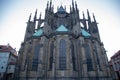 Close-up view of St. Vitus Cathedral against the blue sky.