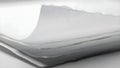 A close-up view of a stack of blank white paper sheets on a table Royalty Free Stock Photo