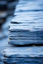 a close up view of a stack of blue slabs