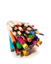 Close up view of stack of colorful pencils on white background