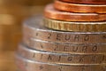 Stack of euro coins with the words `2 euro` engraved on the side of two coins Royalty Free Stock Photo