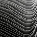 Close-up view of a stack of folded paper creating an abstract, wavy pattern. The paper Royalty Free Stock Photo