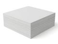 A close-up view of a stack of neatly folded white paper sheets on a table Royalty Free Stock Photo