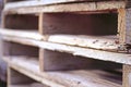 Close-up view of stacked wooden pallets. Wood construction materials Royalty Free Stock Photo