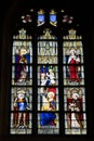 Close up view of stained glass window in the historic Notre Dame de Roncier church in Josselin