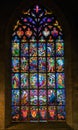 Close up view of stained glass window in the historic Notre Dame de Roncier church in Josselin