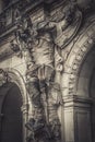 Close-up view of the statue of scary gatekeeper, medieval warrior with weapon. City gate under the Georgenbau in Dresden old town.