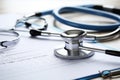 Close-Up View of a Stethoscope and Medical Documents on a Doctors Desk