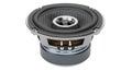 Close-up view of a subwoofer speaker driver with a metallic frame and dust cap Royalty Free Stock Photo
