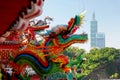 Close up view of a Taiwanese temple decorated with colorful sculptures of sacred & auspicious animals ( dragons )