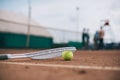 close up view of tennis ball and racquet on court Royalty Free Stock Photo