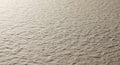 Close up view of textured beige surface with soft lighting effects Royalty Free Stock Photo