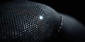 Close up view of a textured black mesh fabric showing reflections and intricate patterns under light Royalty Free Stock Photo