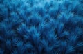 Close-up view of a textured blue surface resembling stylized grass. Abstract pattern, dense arrangement of spiky elements. Royalty Free Stock Photo