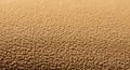 Close-up view of a textured brown suede fabric. The surface appears soft and fuzzy, Royalty Free Stock Photo