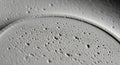 A close-up view of a textured, cratered surface resembling the moon or a planetary surface. The Royalty Free Stock Photo