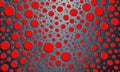 close-up view textured surface with repeating pattern red circles and dots, creating visually striking and Royalty Free Stock Photo