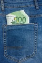 Close Up View to Banknotes Sticking Out From a Blue Jeans Pocket Royalty Free Stock Photo