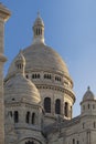 Close-up view of the towers Sacre Coeur Basilica at sunrise, Montmartre, Paris, Fr Royalty Free Stock Photo