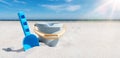 close-up view of toy bucket and spade on sand beach Royalty Free Stock Photo