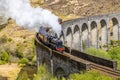 A close up view of a train exiting the viaduct at Glenfinnan, Scotland