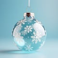 Close up view of transparent blue Christmas ball with relief snowflakes. Decoration bauble. Minimalist design of Christmas tree Royalty Free Stock Photo