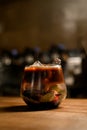 Close-up view of transparent bowl with coffee and herbal drink and ice cubes Royalty Free Stock Photo