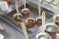 Close up view of turkish coffee prepared on hot golden sand Royalty Free Stock Photo
