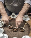 Close up view of turkish coffee prepared on hot golden sand. Royalty Free Stock Photo