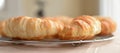 Close-up View of Two Croissants Cooling.