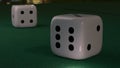 Close up view of two dices on a green table in casino. 3d rendering. Royalty Free Stock Photo