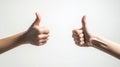 Close-up of hands framing approval symbol with thumbs up gesture, showcasing quality confirmation and positive feedback in a Royalty Free Stock Photo
