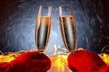 Close-up view of two hands wearing warm outfit holding in hands glasses sparkling wine congratulation with New Year or Christmas Royalty Free Stock Photo